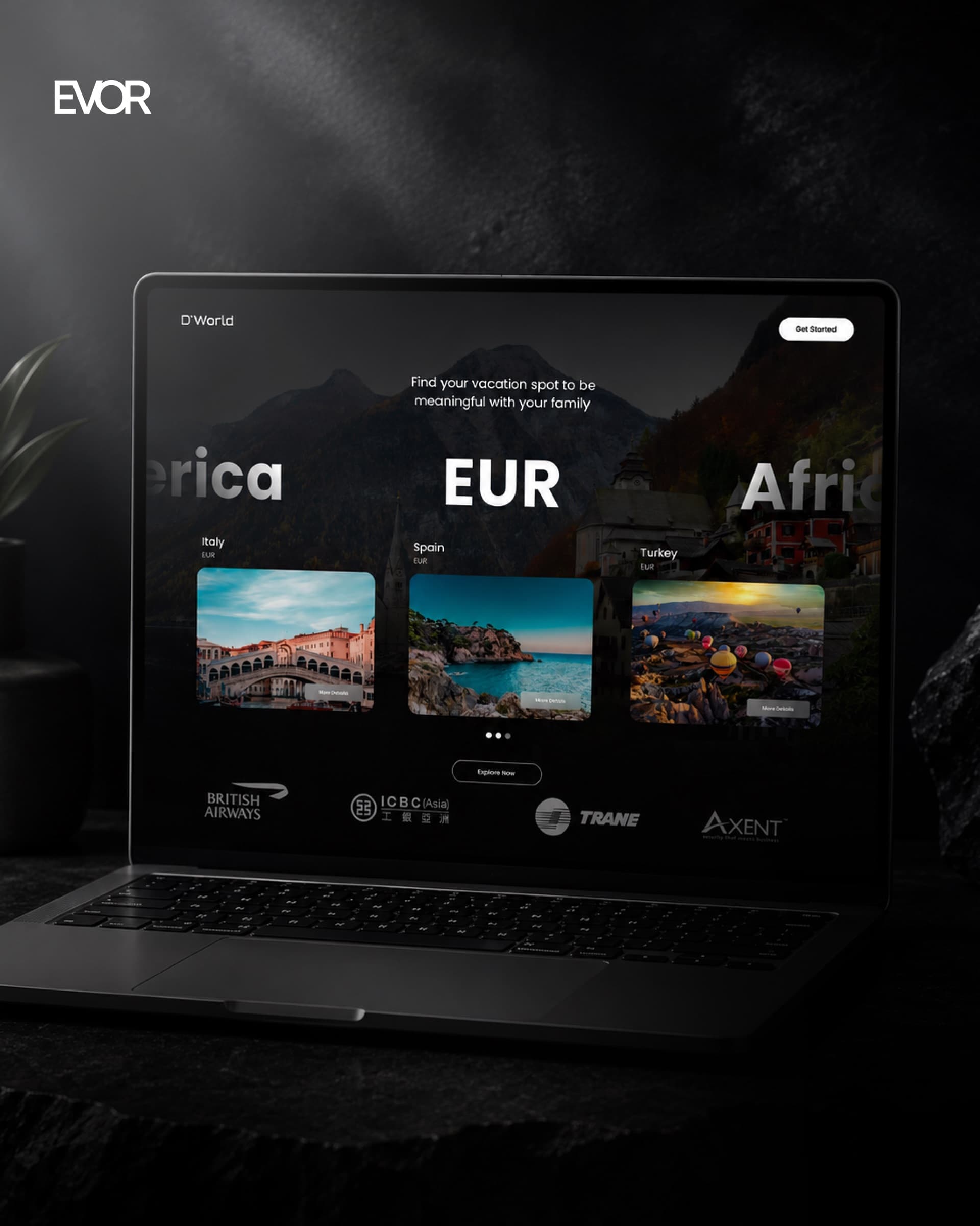 D'World cover: the destination browser open on a laptop in a dark studio setting.